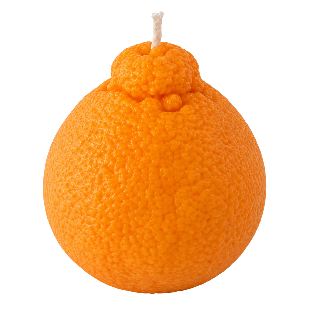 An orange-shaped novelty candle with a textured orange peel surface and a white wick on top, isolated on a solid black background.