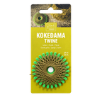 A package of Kokedama Twine by Starter Studios, featuring a roll of tan twine wrapped into a circular kokedama web with bright green tips, mounted on a yellow cardboard backing.