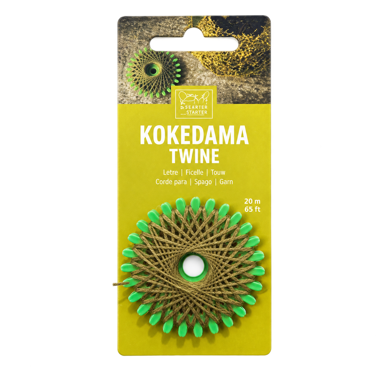 A package of Kokedama Twine by Starter Studios, featuring a roll of tan twine wrapped into a circular kokedama web with bright green tips, mounted on a yellow cardboard backing.